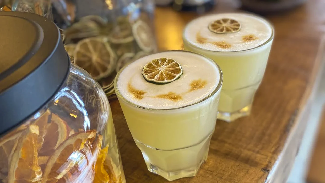 Two pisco sour glasses in parks and along the seafront promenade for National Pisco Sour Day 2026.