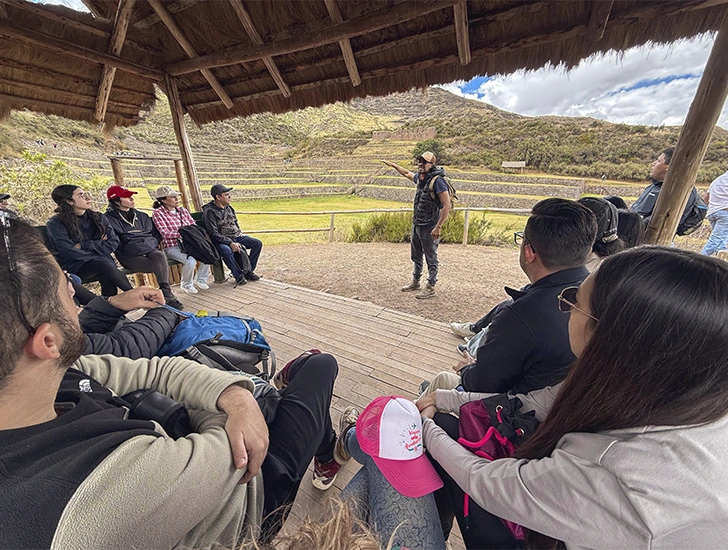tour-guide-explaining-at-tipon-south-valley-cusco-tour